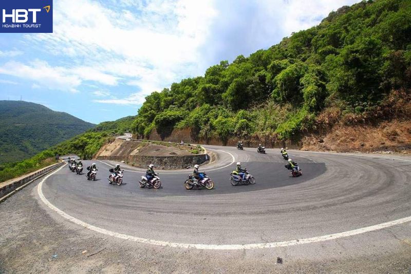 Riding a motorbike along the scenic coastal road from Hue to Hoi An